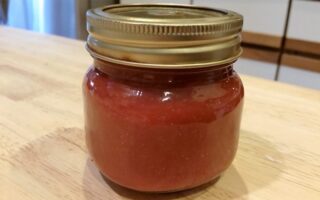 Finished ketchup in small mason jar