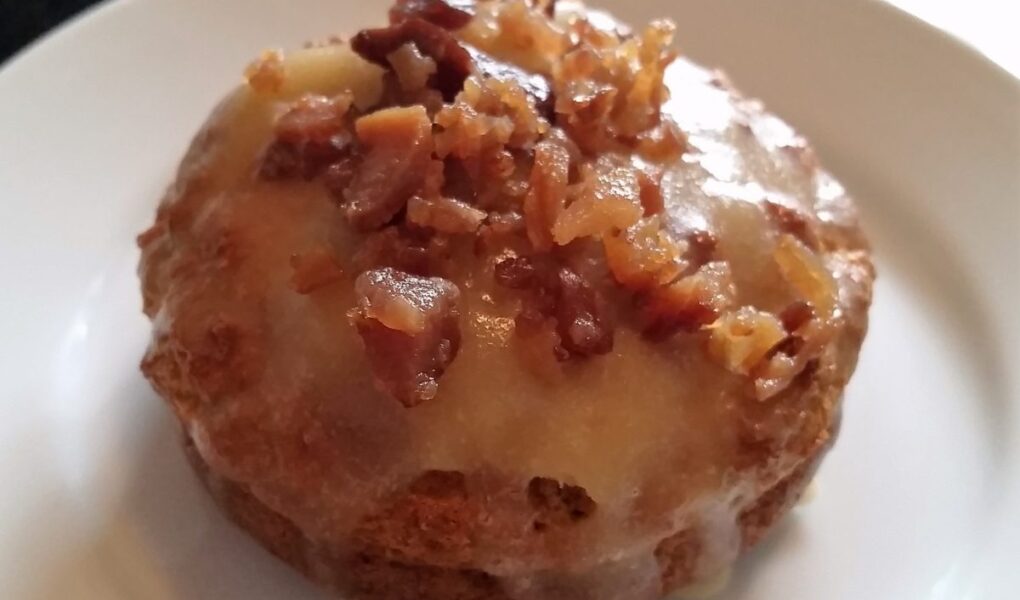 Low Carb Maple Glazed Bacon Donut on white plate