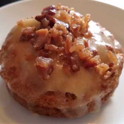 Low Carb Maple Glazed Bacon Donut on white plate